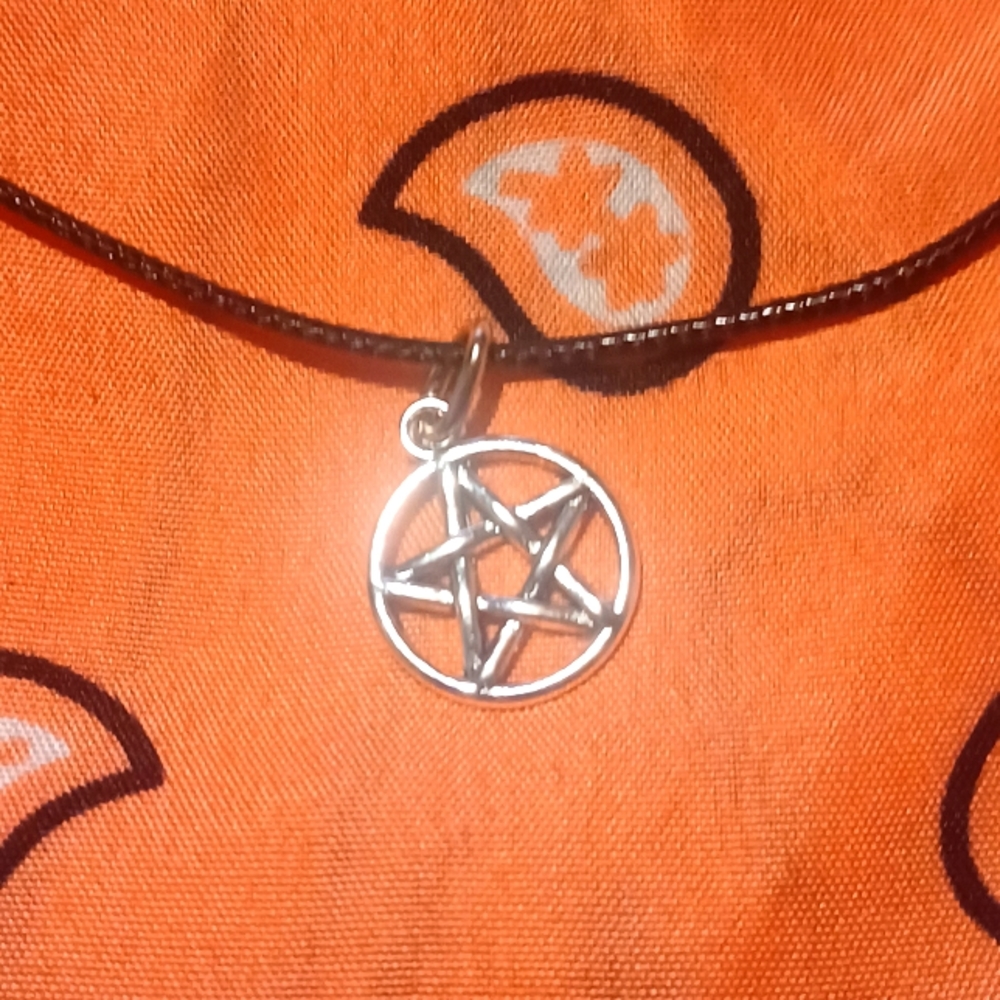 Black cord necklace with pentagram charm